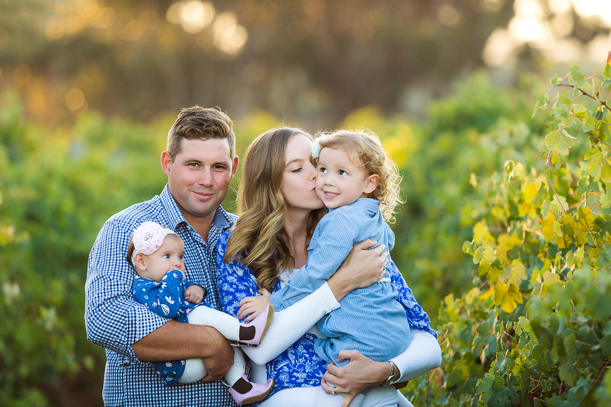 Family hugs in the vineyards family photography by deb elton photography